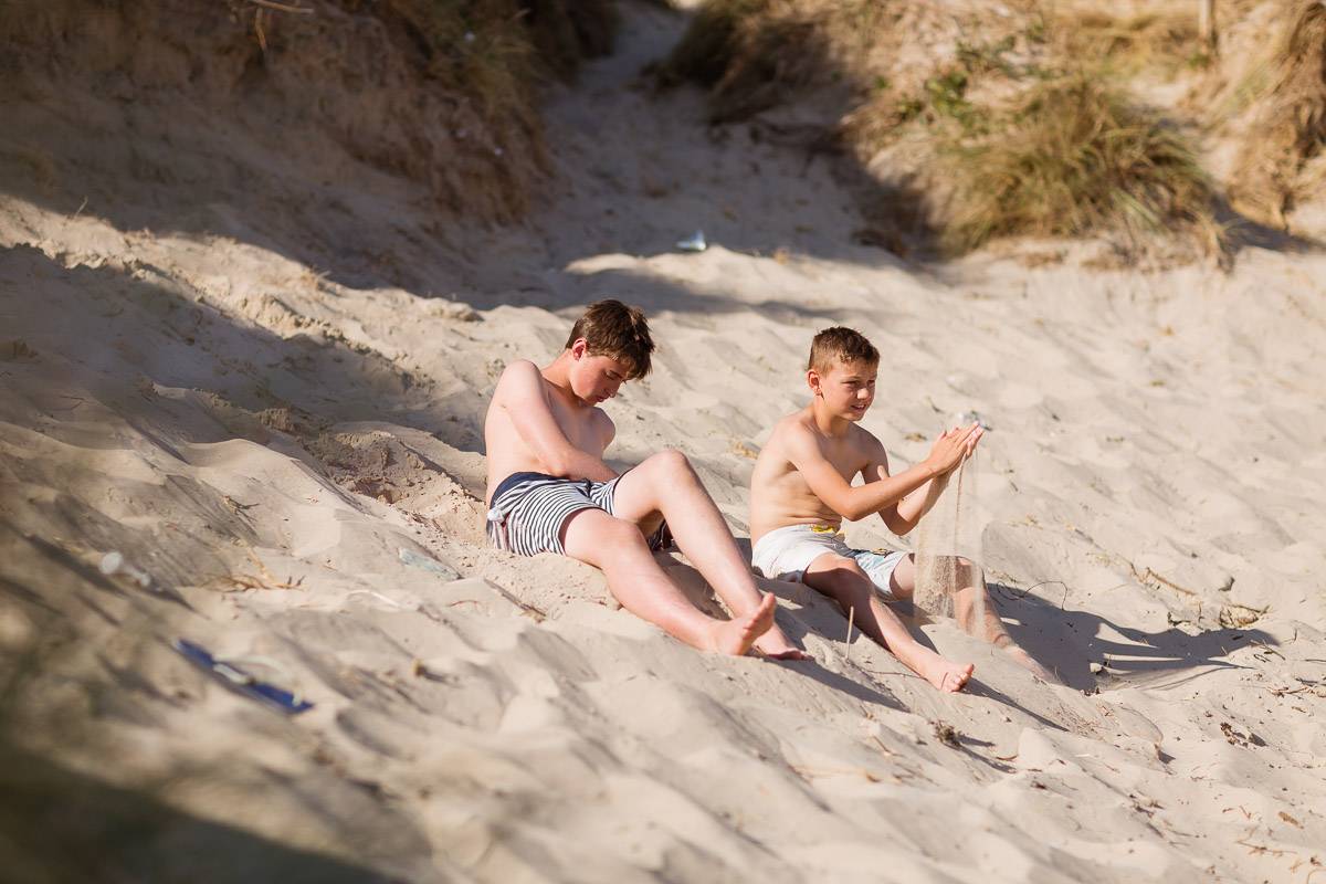 silver-bay-holiday-village-anglesey-two-boys-on-silver-bay-beach.jpg
